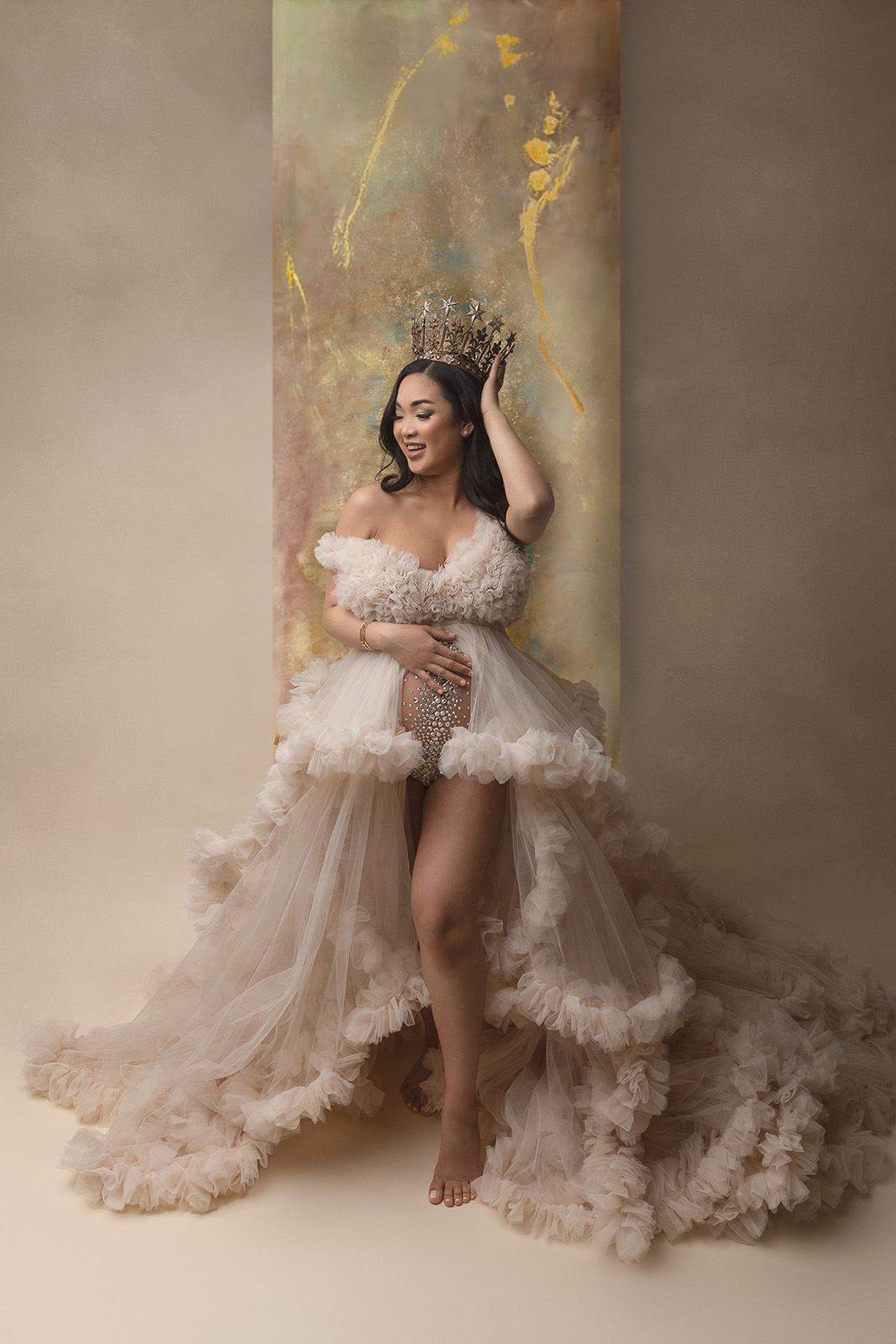 In Studio pregnancy photo shoot with crown and stunning dress