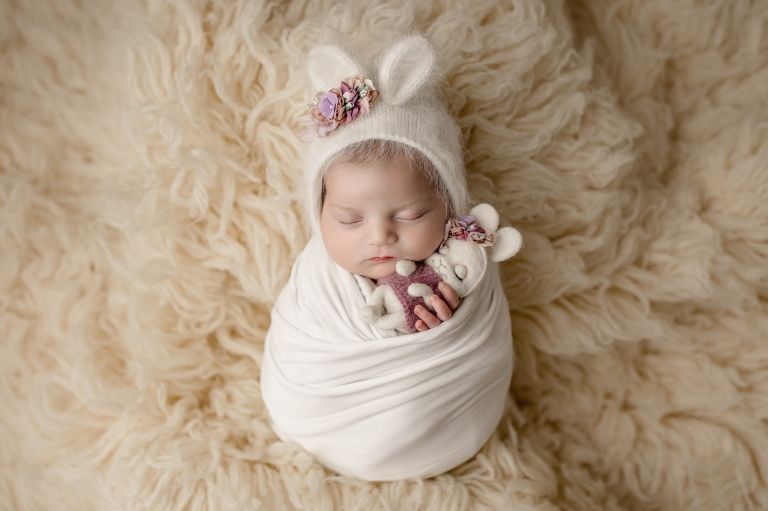 Newborn photography regret captured through a timeless newborn portrait