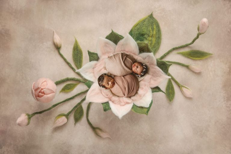 Twin newborn portrait highlighting connection and comfort