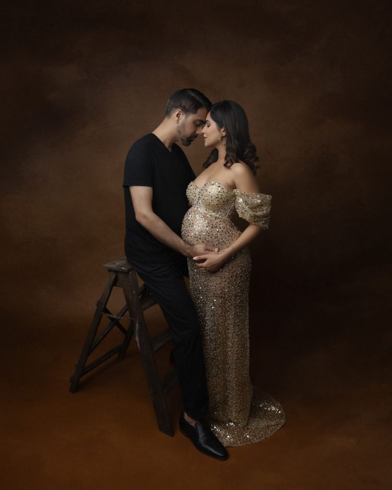 Maternity photography with partner showing intimate connection, fine art maternity session Frisco