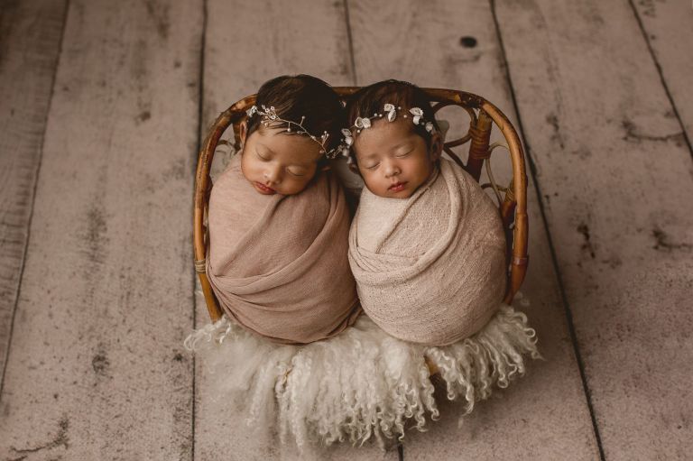 Twin newborn photography in Dallas capturing a calm, safety-first studio session