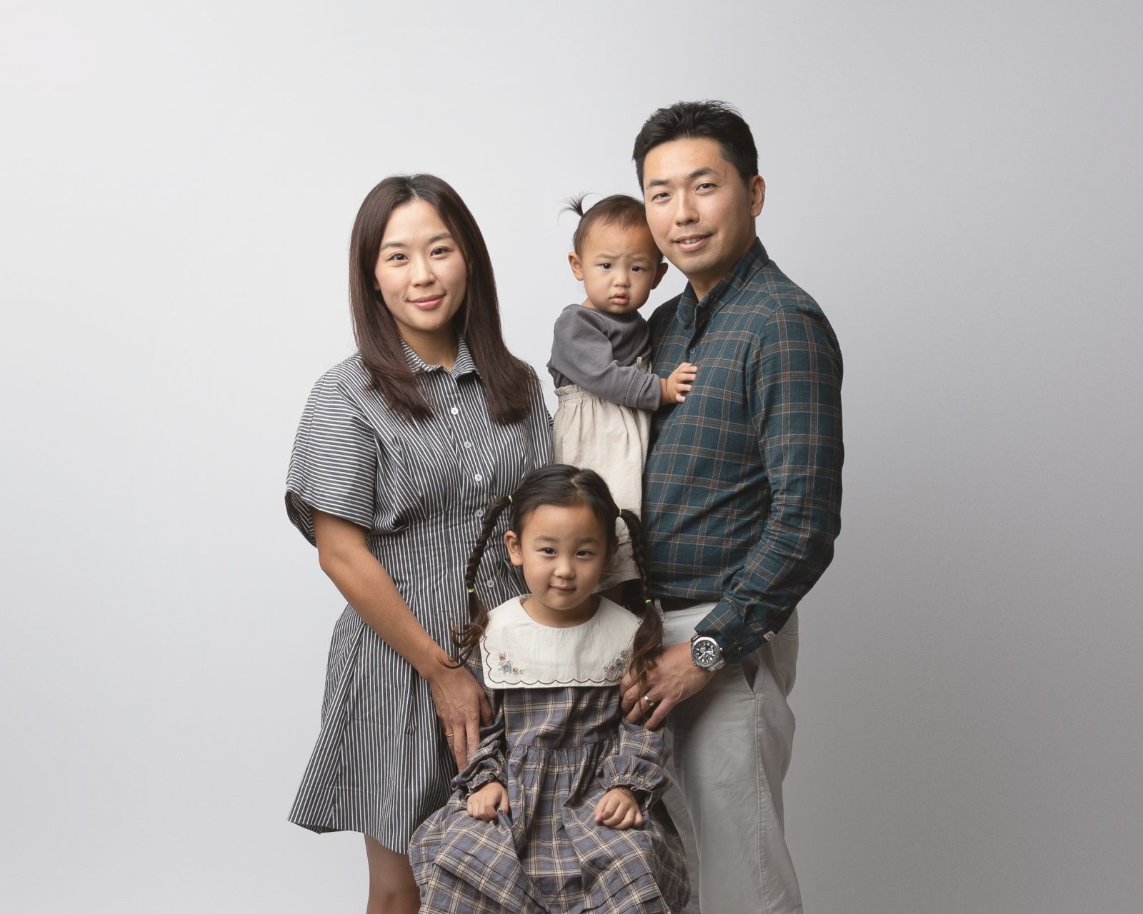 Studio family photography in Dallas with timeless neutral styling